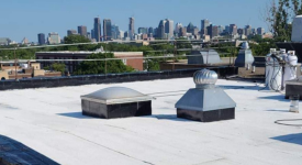 Renovated roof with a view of the Montreal skyline in the background